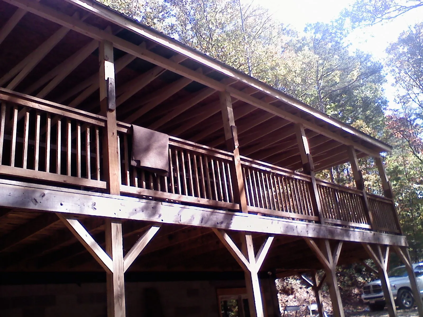 Timber framing under a new elevated porch and deck — Roof Leak Repair in Bridger by Roofing Brothers